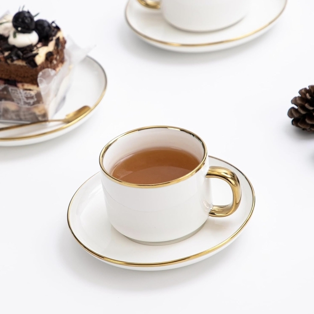 Elegant White Porcelain Teacup and Saucer Set with Gold Trim - Home Dining - Picture 3 of 8